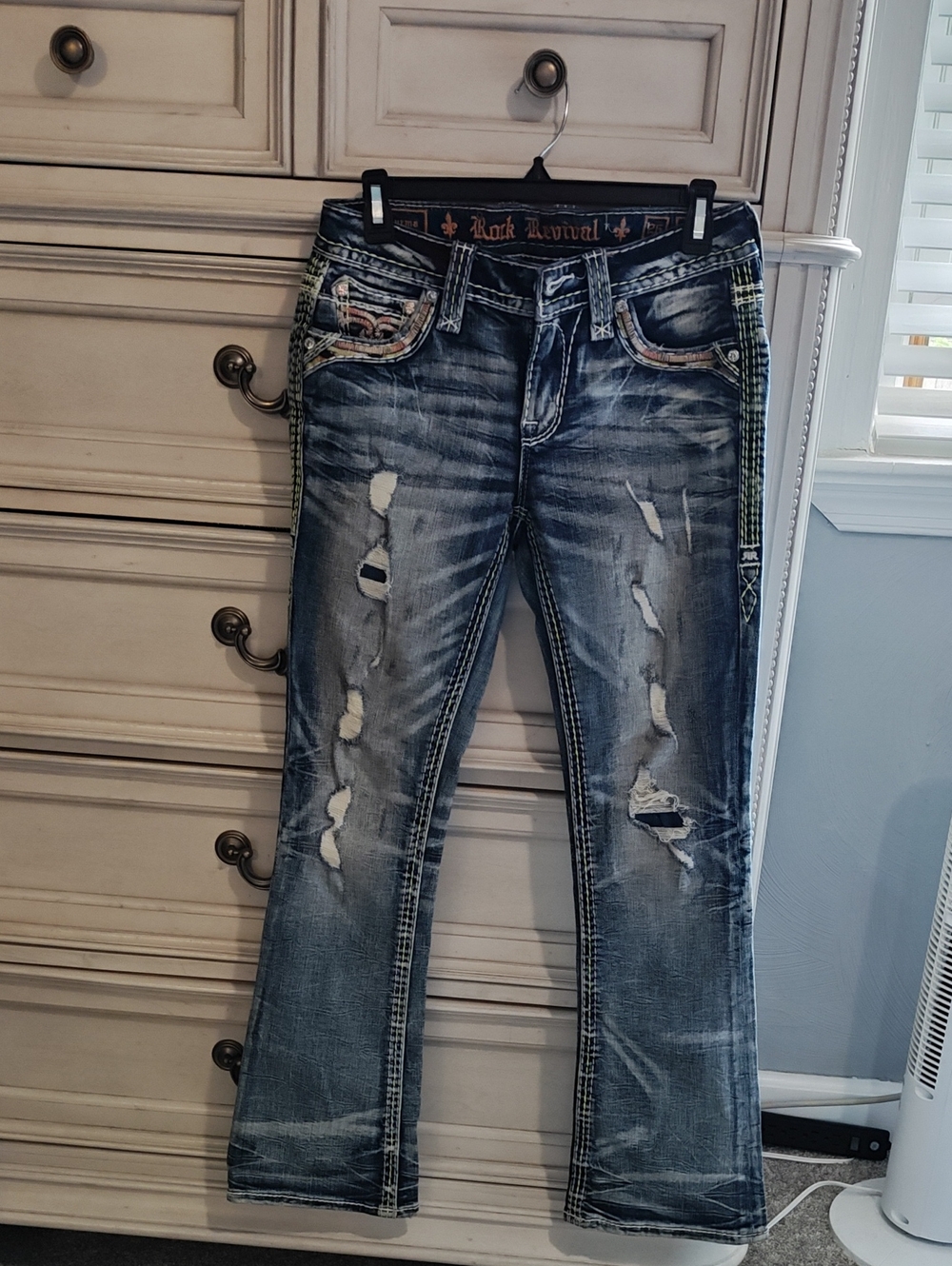 Rock Revival Women's Distressed Bootcut Jeans in Faded Blue